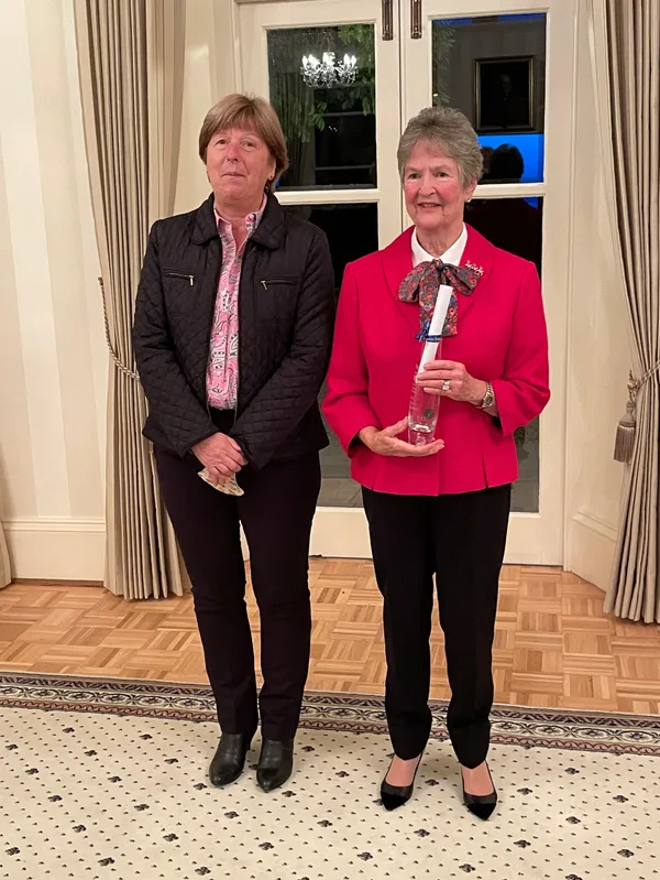 Frances Cambrai-Bell, right, received the platinum award of an engraved vase from Lady Corder for 30 years of voluntary service. (30173023)