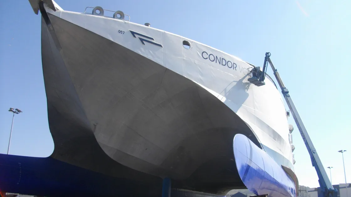 Condor Voyager having her new name put on in Cherbourg. (29475537)