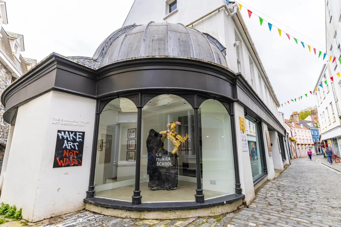 Le Murier School’s Lily the Goat sculpture takes pride of place in the gallery window