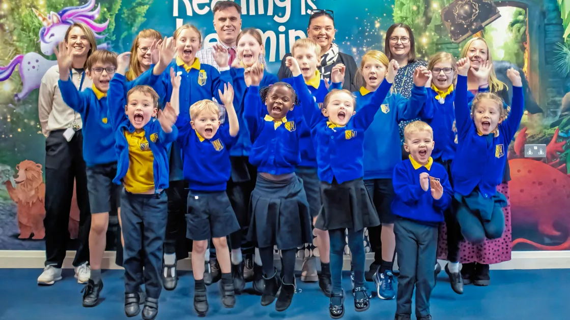 St Martin’s School pupils and teachers celebrate a largely good Ofsted report which has built on its previous report from 2022.  (Picture by Tessa Le Gallez, 34578870)