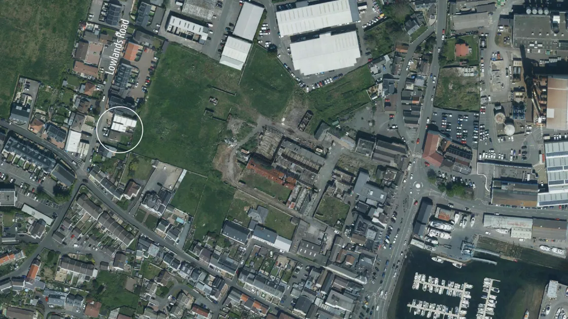 The States has purchased an engineering workshop and two houses, shown circled, next to Leale’s Yard to make way for a new road linking Route Militaire to the Bridge.