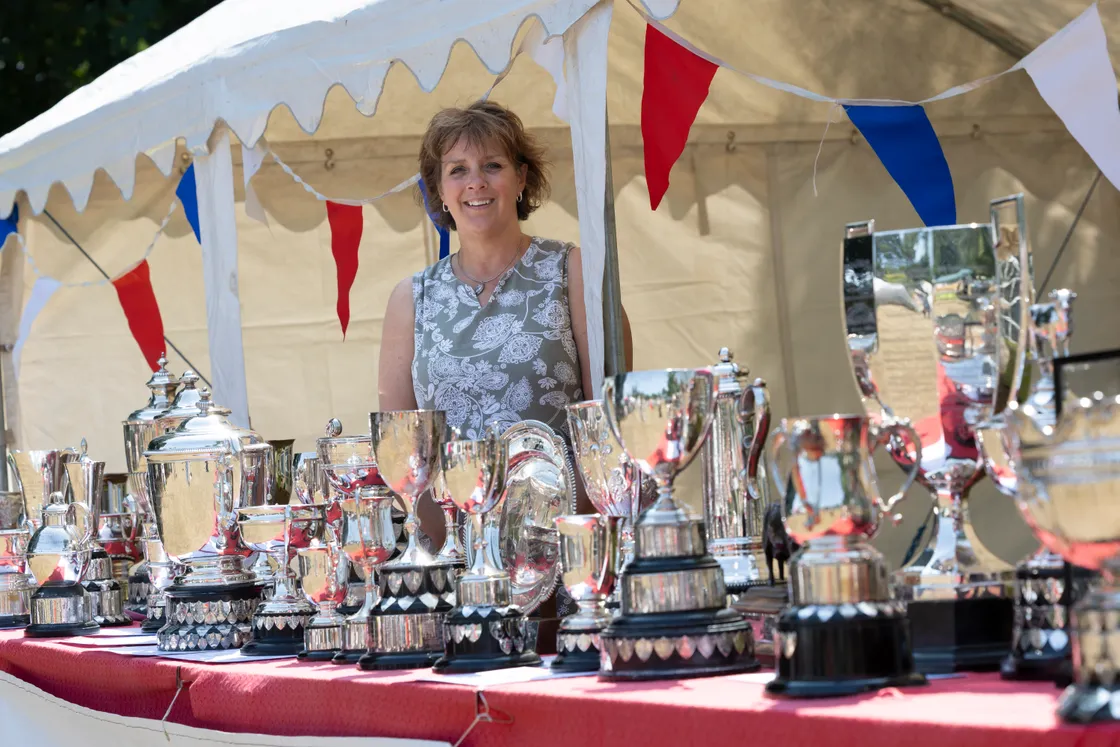 Liz Naftel with some of the trophies up for grabs.	