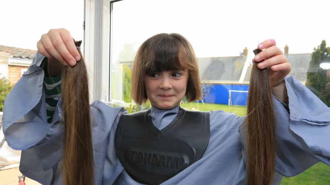 Beatrix Buchanan, 8, after stylist Tracy Gilheany had cut her foot-long hair. She donated it to The Little Princess Trust and also raised money for Care International for children in Yemen. (Pictures by Adrian Miller, 29393743)