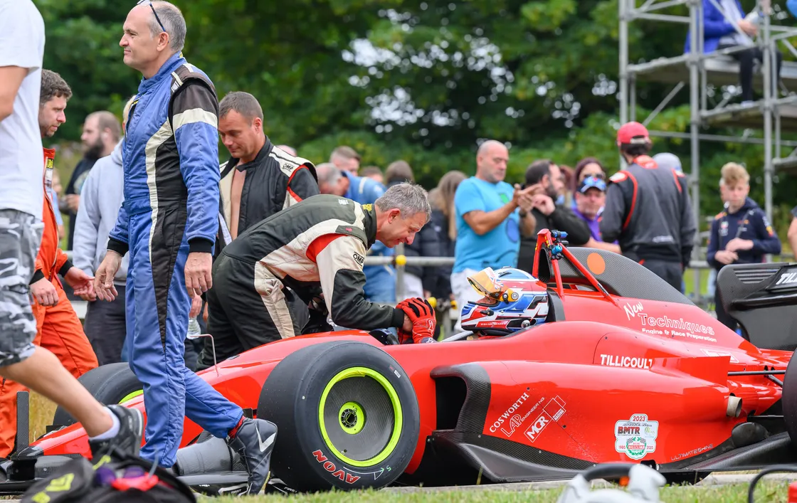 Nick Saunders congratulates Wallace Menzies on winning the Round 20 Run Off. (Picture by Andrew Le Poidevin)