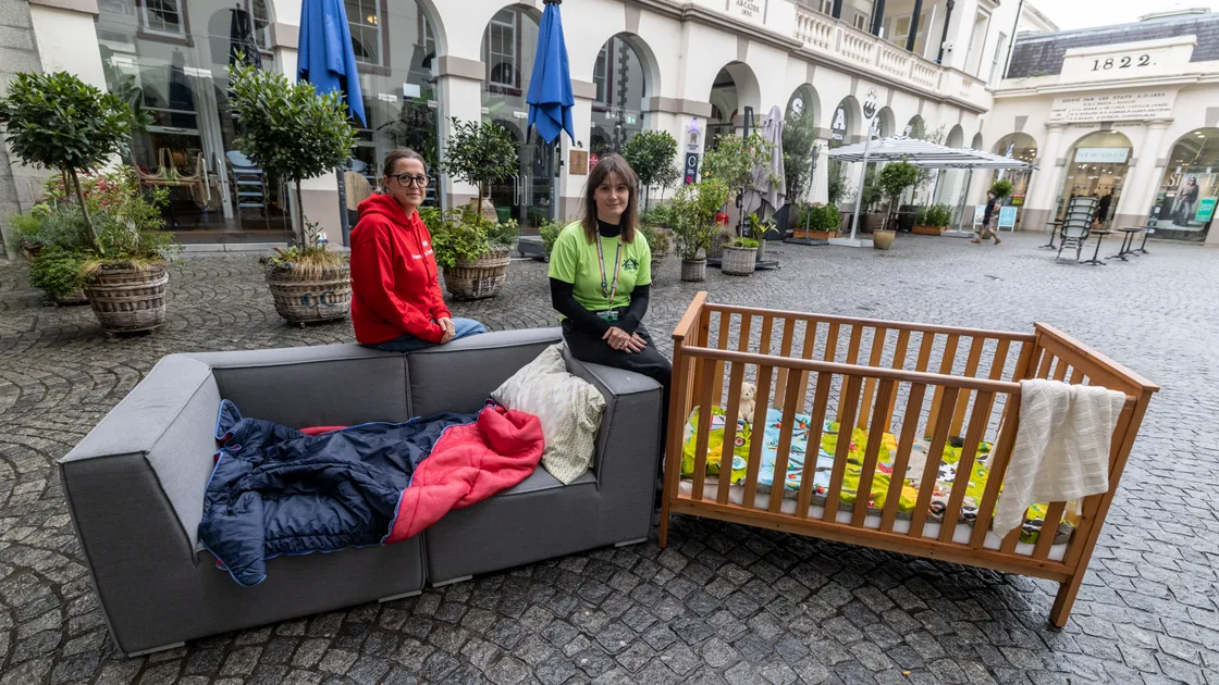 Lisa Stephen, left, and Caitlin Duquemin with an installation in Market Square to mark World Homeless Day. (Picture by Peter Frankland, 34971388)
