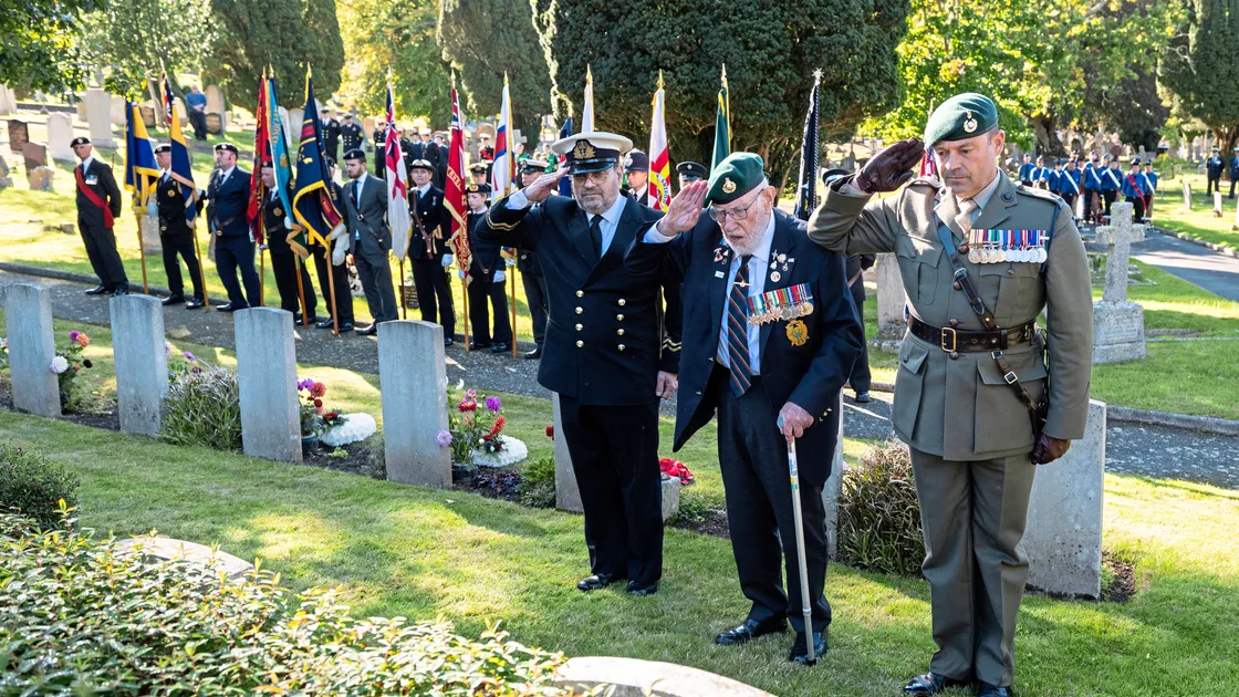 The HMS Charybdis and HMS Limbourne memorial service was held at Le Foulon Cemetery yesterday. Left to right, Lt Tony Browning of Guernsey Sea Cadets, John Eskdale, a Royal Marine who was aboard HMS Charybdis when she was sunk by German torpedoes on October 23, 1943, and Major Chris Kedward. 								 (Picture by Peter Frankland, 34422380)
