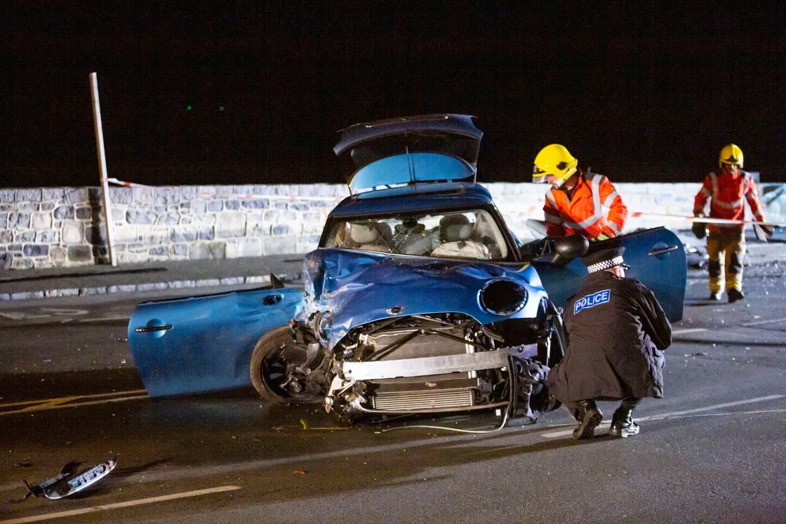 Single vehicle crash along the front in middle of night