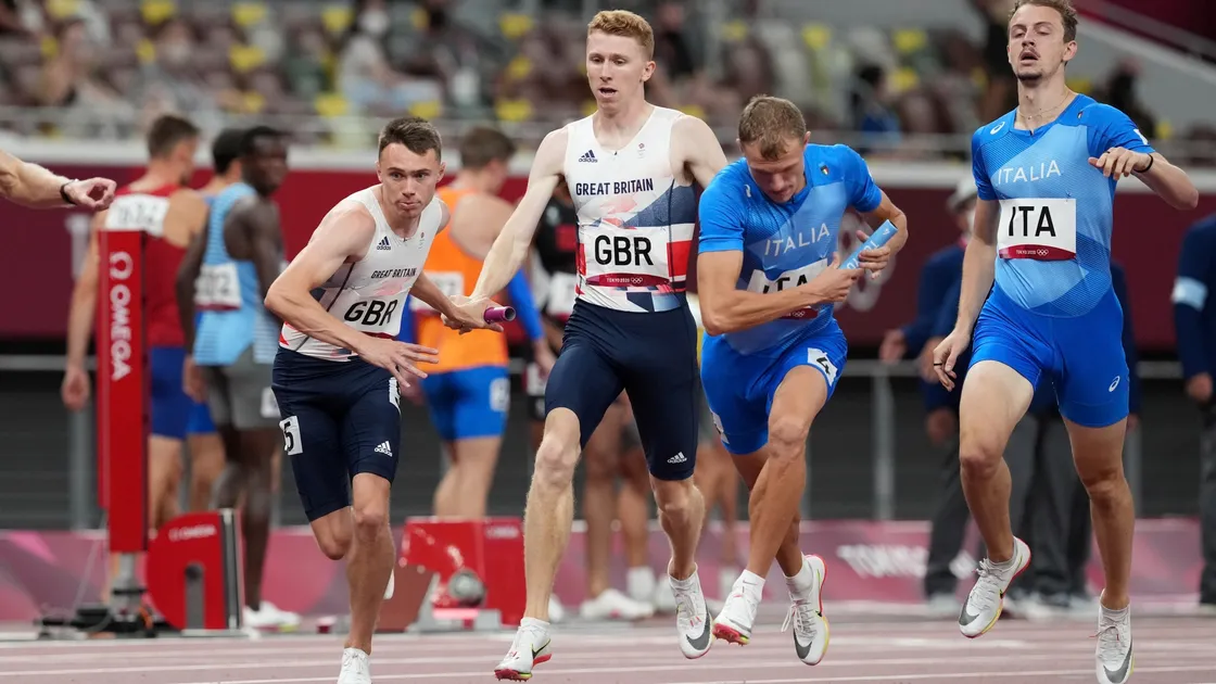 Cameron Chalmers in relay action at the Tokyo 2020 Olympics as he hands the baton to GB teammate Joseph Brier. (Picture PA Wire / PA Images, 30105408)
