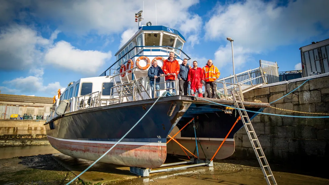 Picture by Sophie Rabey.  04-02-22.   Work on the Travel Trident has been taking place in St Sampsons Harbour.L-R Garry Edwards, Peter Wilcox, Craig Masterman, Rachid Kandili (all Travel Trident) and Dan Hamon (from Hamon Fabrications Ltd) (30466122)