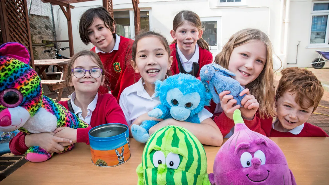 Vauvert School’s Orang-utan Day saw pupils extend their Precious Planet topic with Years 3 and 4 pupils organising stalls which raised £470, enough for each year group to adopt an orang-utan for the rest of their time at the school. Pictured, left to right, front row, are Keira Lewis, 8, Cynthia Leggett, 9, Phoebe Collas, 9, and Lewis Mahy, 7. Behind them are Seb Maunder, 9, and Evie Snook, 8.(Picture by Adrian Miller, 24210435)