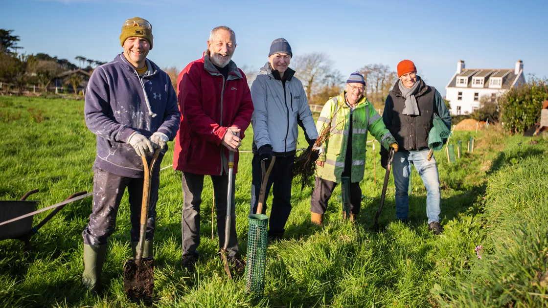 Bob Gallagher, left, invited Guernsey Trees for Life members, left to right, Alan Ritchie, Andy McCutcheon, Vic Froome and John de Garis to plant alders on his land in St Saviour’s. (Picture by Luke Le Prevost, 31579440)