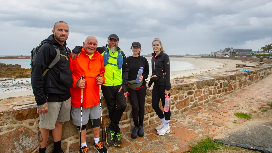 Roger Baudains, second from left, at Cobo with, left to right, Callum Le Moignan, Mark Prevel and Abbie and Zara Baudains. (Picture by Karl Dorfner, 33479250)