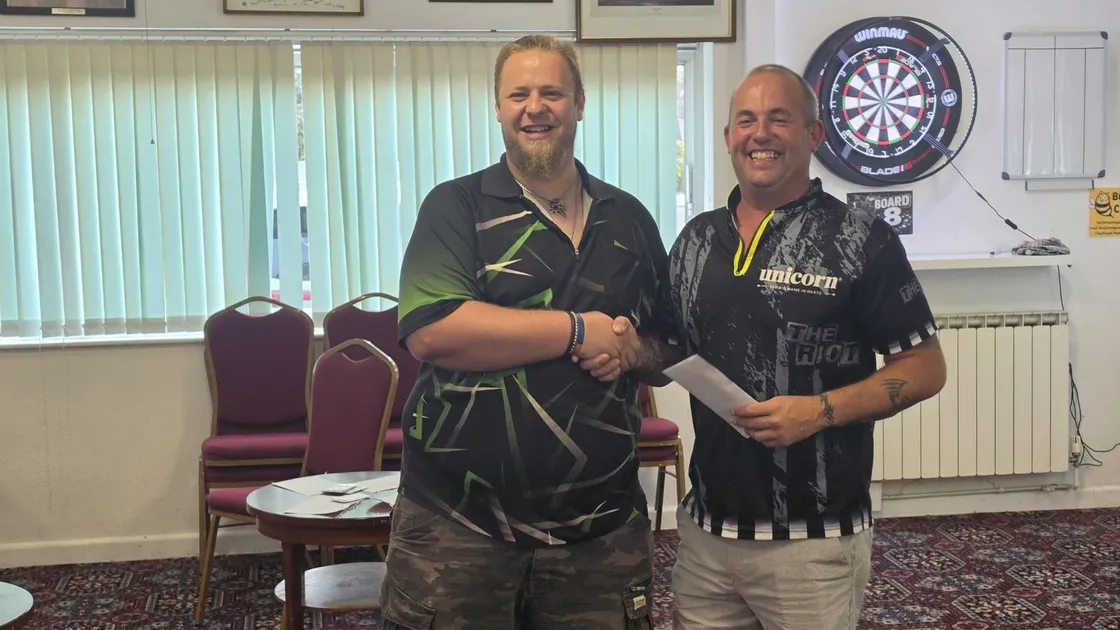 Jason Allez is presented with his prize by Leyton de la Mare.