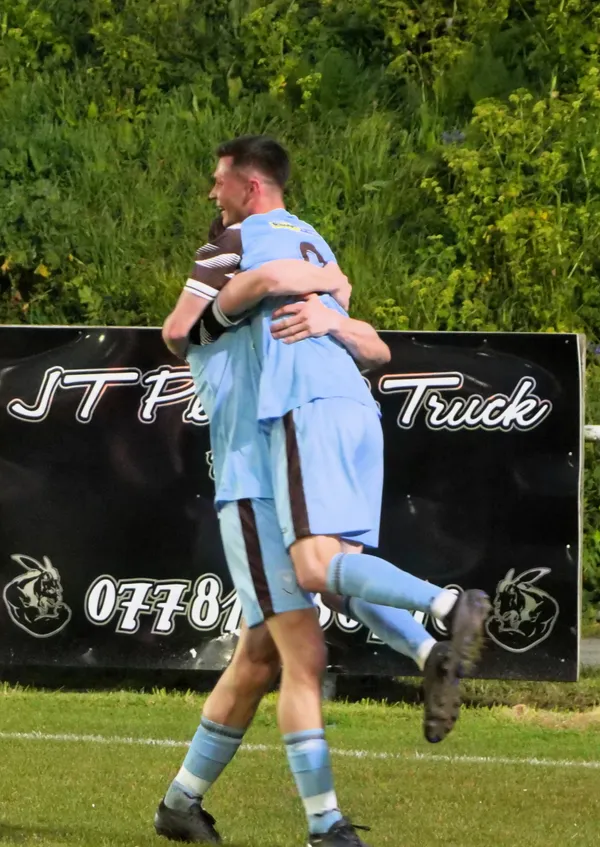 North No 9 Keene Domaille celebrates his first goal with Archie Drillot.