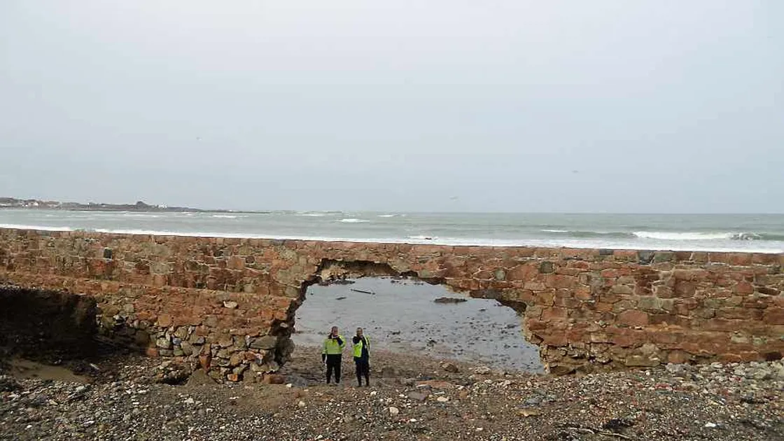Sea smashes massive hole in Vazon coast wall