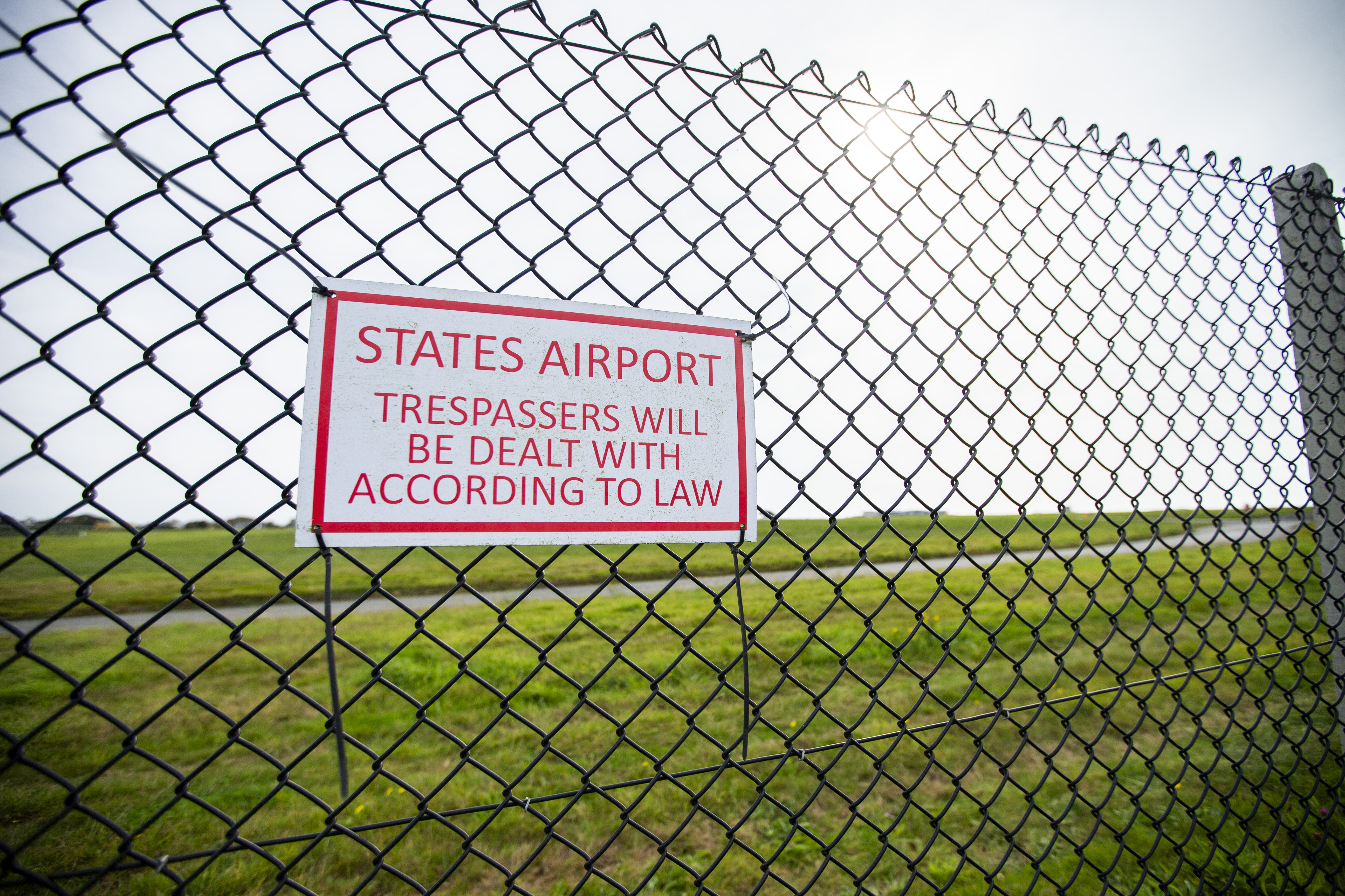 Man accused of twice scaling airport fence denies charges