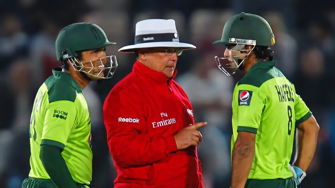 Referee Ian Gould speaks to Pakistan batter Mohammad Hafeez during a one day international in Southampton. (Picture from PA Images)