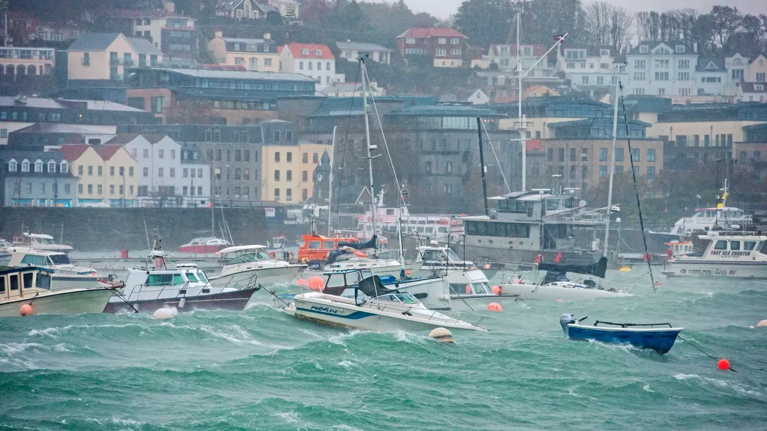 Boats moored in the pool were being thrown around by the large waves and strong winds. (Picture by Peter Frankland, 33805308)