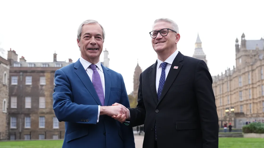 Reform UK leader Nigel Farage and Andrew Rosindell on College Green in Westminster