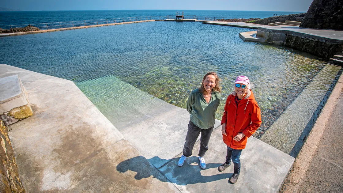 The Guernsey Community Foundation has continued its support for the regeneration of the pools at La Vallette with a £22,0000 donation towards the access ramp, which is a work in progress and will have railings fitted. Pictured there yesterday were Helen Bonner-Morgan, left, the community lead for Vive La Vallette, and Fiona Bateson, chairwoman of the Foundation’s grants panel. (Picture by Sophie Rabey, 30735828)