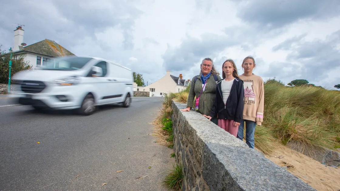 Patricia Gerards and her twin daughters, Berlinda and Muriel, 12, at the junction with Castle Road and Les Rocques Barrees Road. (Picture by Peter Frankland, 32588178)