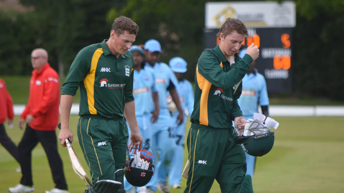 Ben Ferbrache and Matt Stokes walking off at the end of an innings in 2015