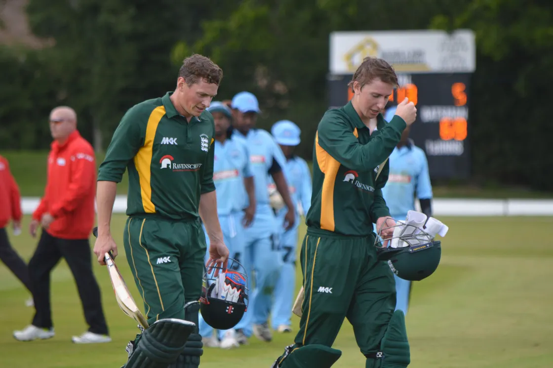 Ben Ferbrache and Matt Stokes walking off at the end of an innings in 2015