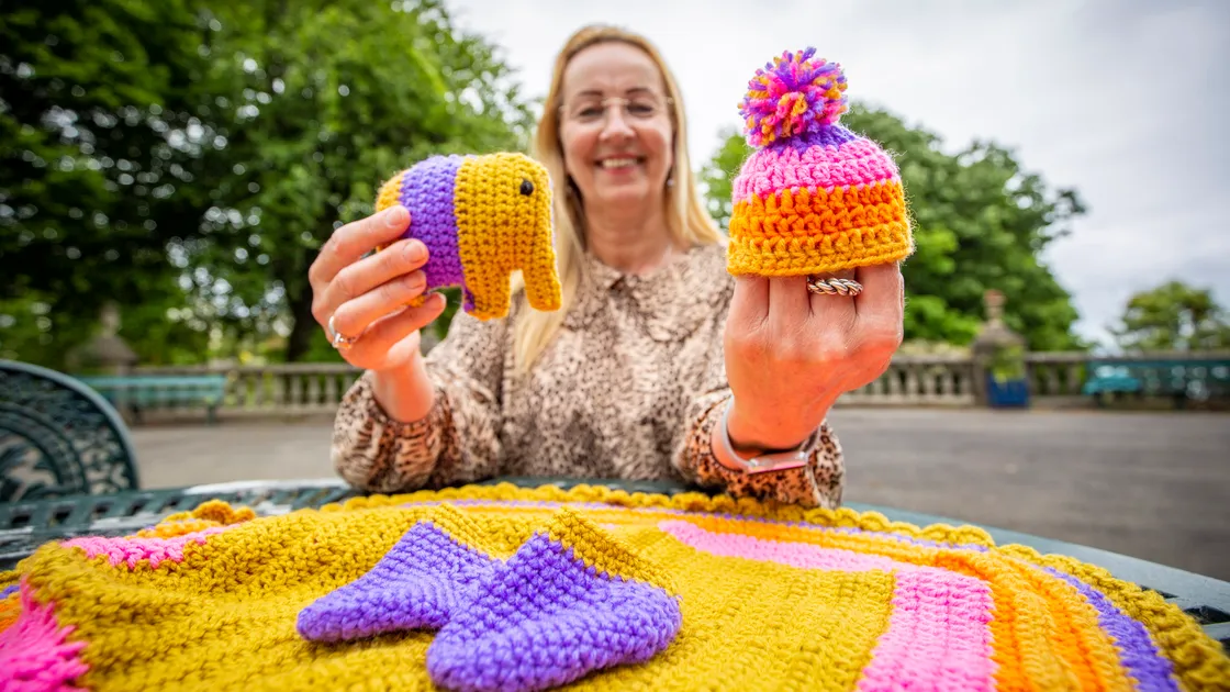 Appeal founder Lilita Kruze pictured in 2022 with some of the knitwear destined for Ukraine