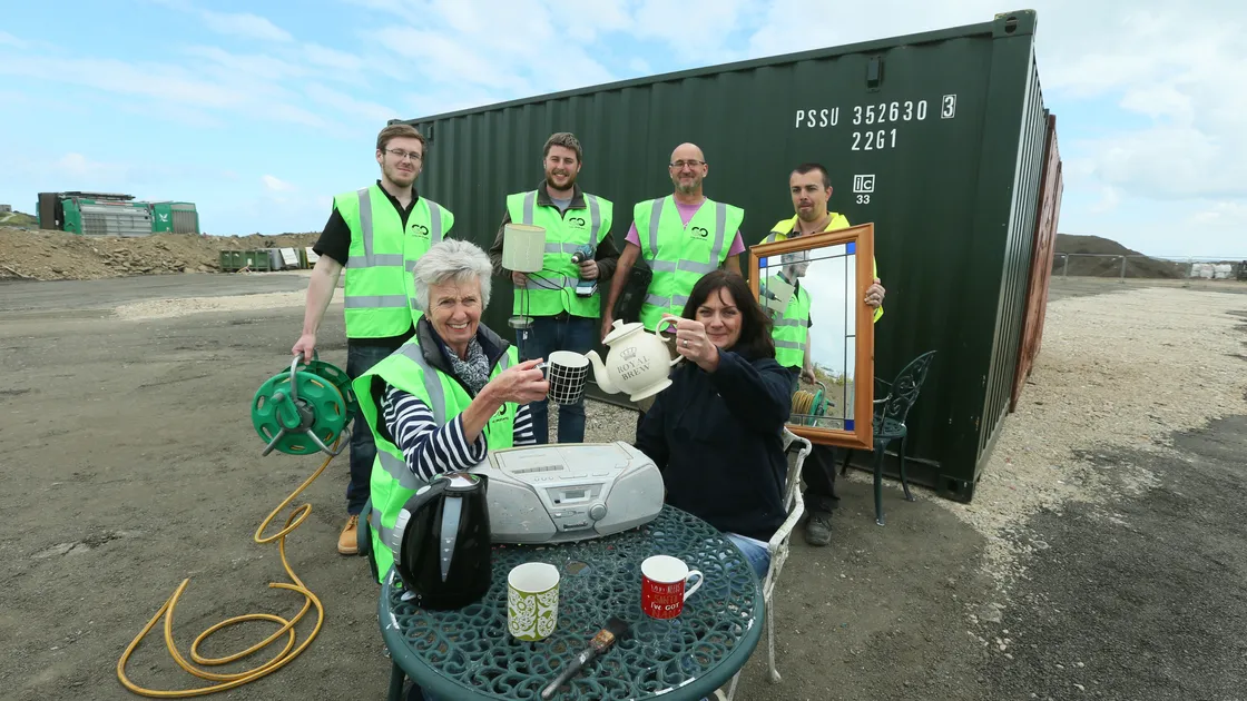 The launch of the new-look reuse service in April 2017 as Go (Giving Opportunities) moved in at the Longue Hougue site. In front are Sarah Bamford, left, the founder of Go, and States waste prevention and recycling officer Tina Norman-Ross. Behind, left to right, are Tom Williams, Phillip Le Page, David Montgomery and waste service manager Joe Adams.  (30635400)