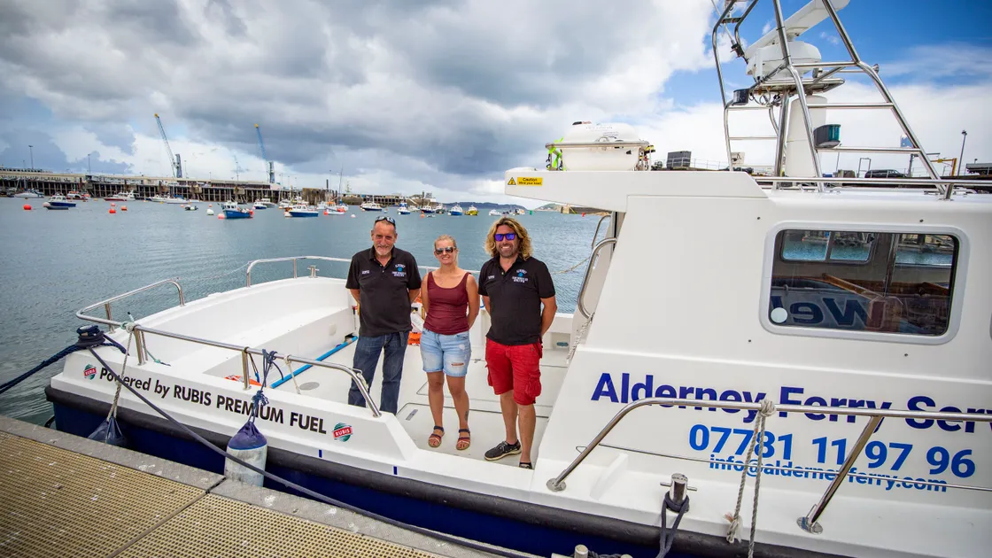 Alderney Ferry Services’ joint lead skipper Clive Braund, company director Charlie Smith and company director and jointlead skipper Dan Slimm on Causeway Explorer in June.  (Picture by James Black)