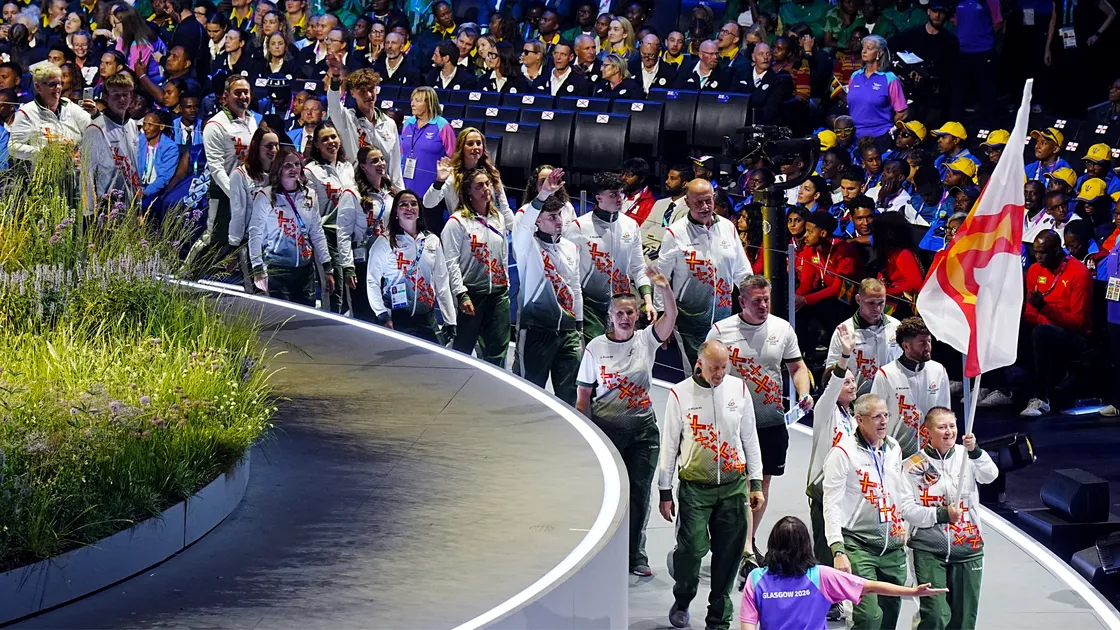 Husband and wife bowls players Ian and Alison Merrien had the honour of leading out the island at tonight’s Commonwealth Games opening ceremony.