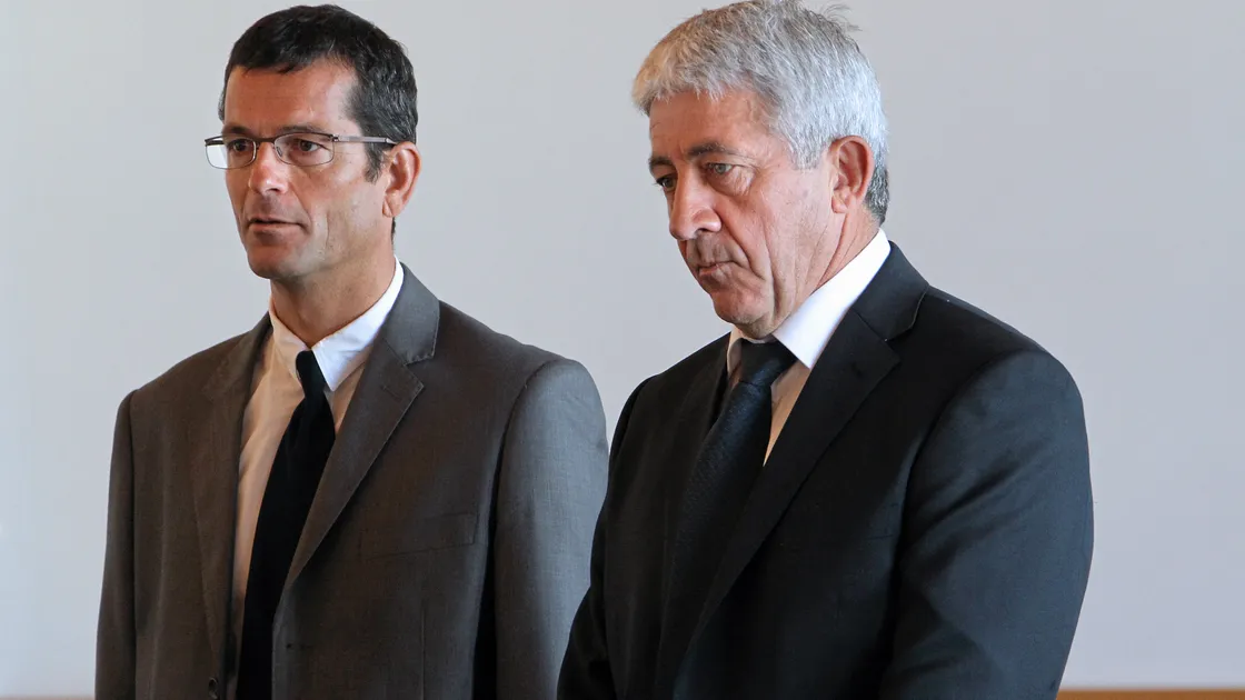 The former captain of the British ferry Condor Vitesse, Paul Le Romancer, right, and his first mate Yves Tournon, 48, both French citizens, stand in court on June 26, 2013 in Coutances, France before the start of their trial. (Picture: Charly Triballeau/AFP/Getty Images)