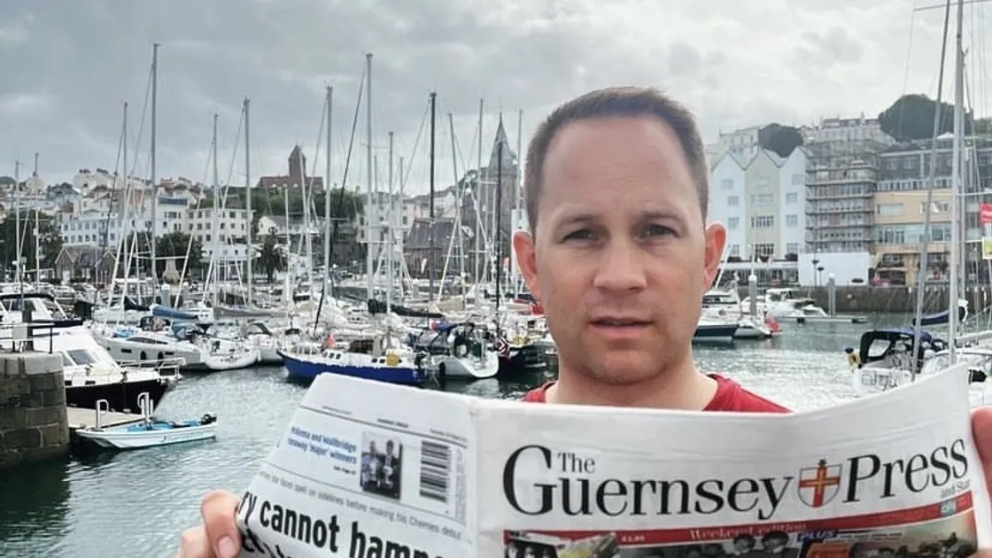 Another photo for his Instagram account @paperboyberlin, German newspaper enthusiast Thorsten Kirschner pictured with a Guernsey Press.  (32476875)
