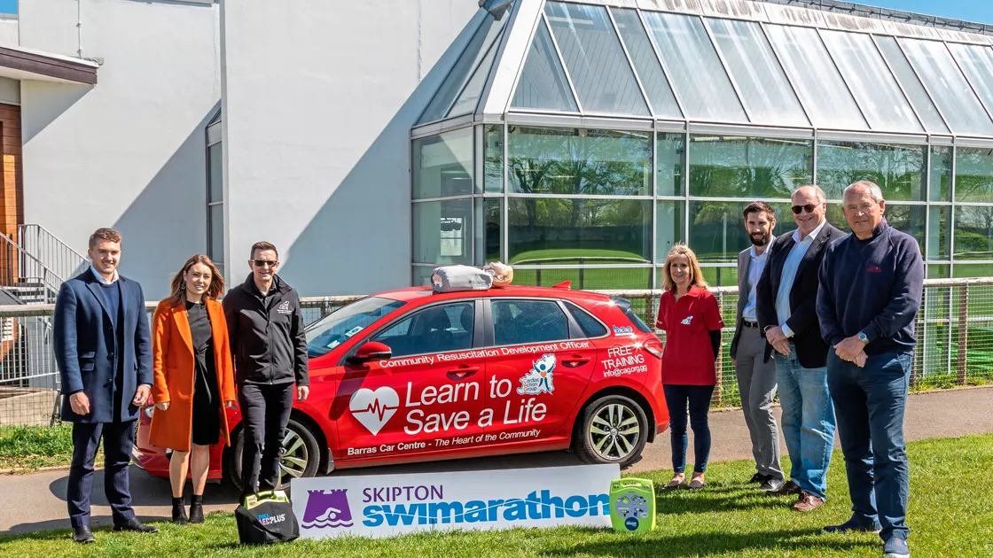 Left to right: Declan Maginnis and Caroline Aylward from Skipton, Mike Froome, Jerry Le Roy from the Cardiac Action Group Committee, Aaron Walden from Skipton, Rob Holder from the Lions Club and chairman of the Swimarathon committee Nick Guillemette.