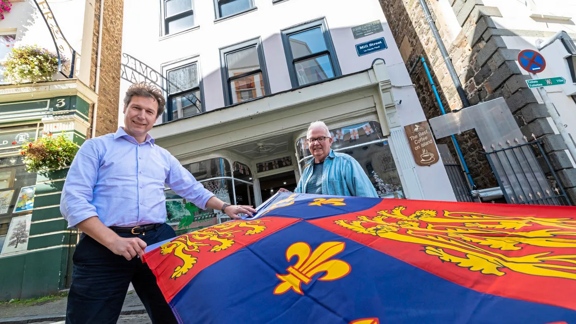 Daniel Klaassen and David Savident with the 16th century standard of the King, who would have ‘owned’ the three nearby mills at that time