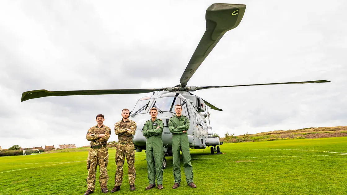 A Royal Navy helicopter landed at Port Soif as part of a training exercise in the islands on Friday. Left to right, Liam Bolger, Michael Dalton, David Houghton-Barnes and Eddie Riley in front of their Commando Merlin Mk4. (Picture by Sophie Rabey, 34421272)