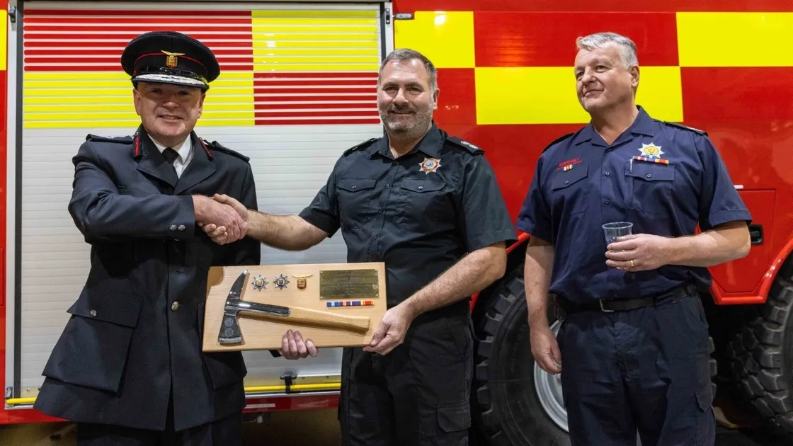 Airports fire manager Pete Bretel, left, Jim Manning and Guernsey Fire & Rescue Service head of training Tim Falla (representing chief fire officer Jon Le Page), right. (31681346)