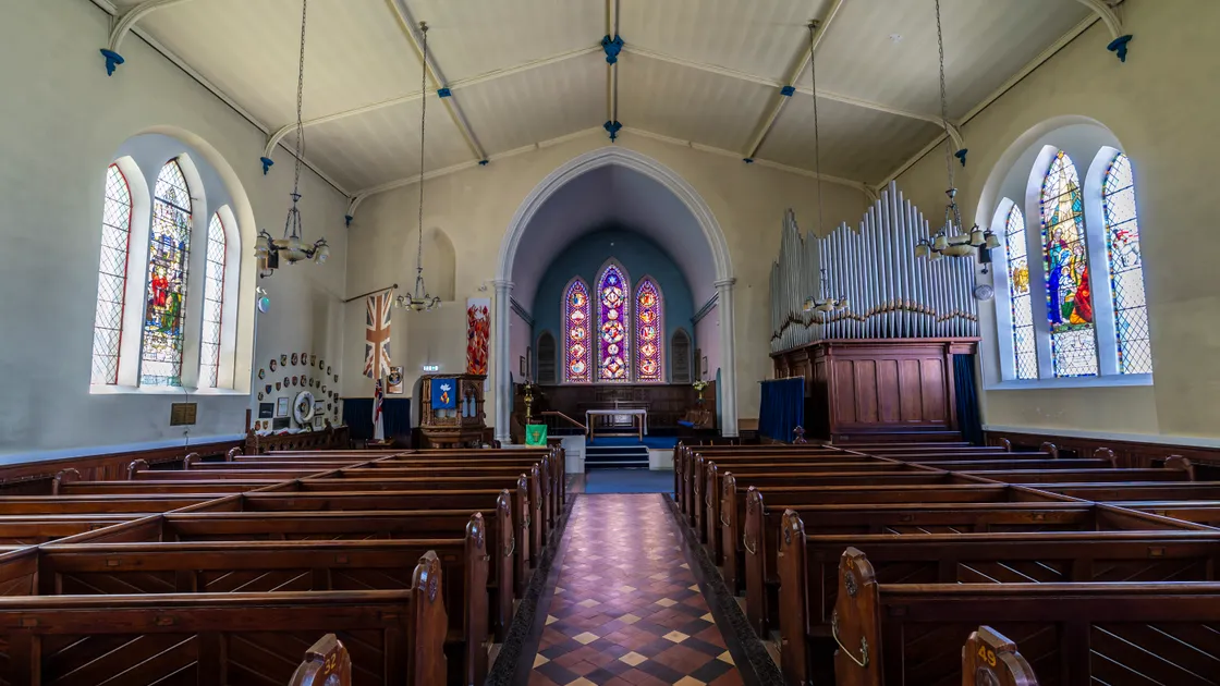 The iron frame of the stained glass window in the chancel at St John’s Church has corroded and leached rust, damaging nearby plaster. (Picture by Peter Frankland, 34786950)