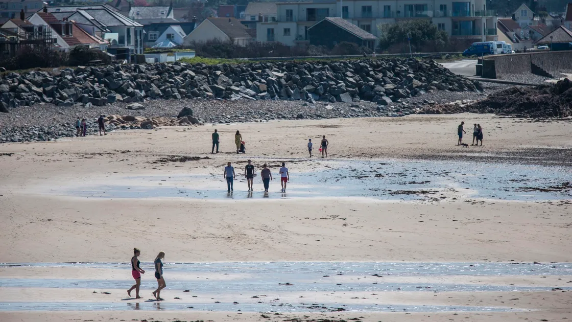The vast majority of islanders obeyed the lockdown restrictions on a glorious Good Friday, including walking on the beach with suitable social distancing. (Picture by Sophie Rabey, 27966721)