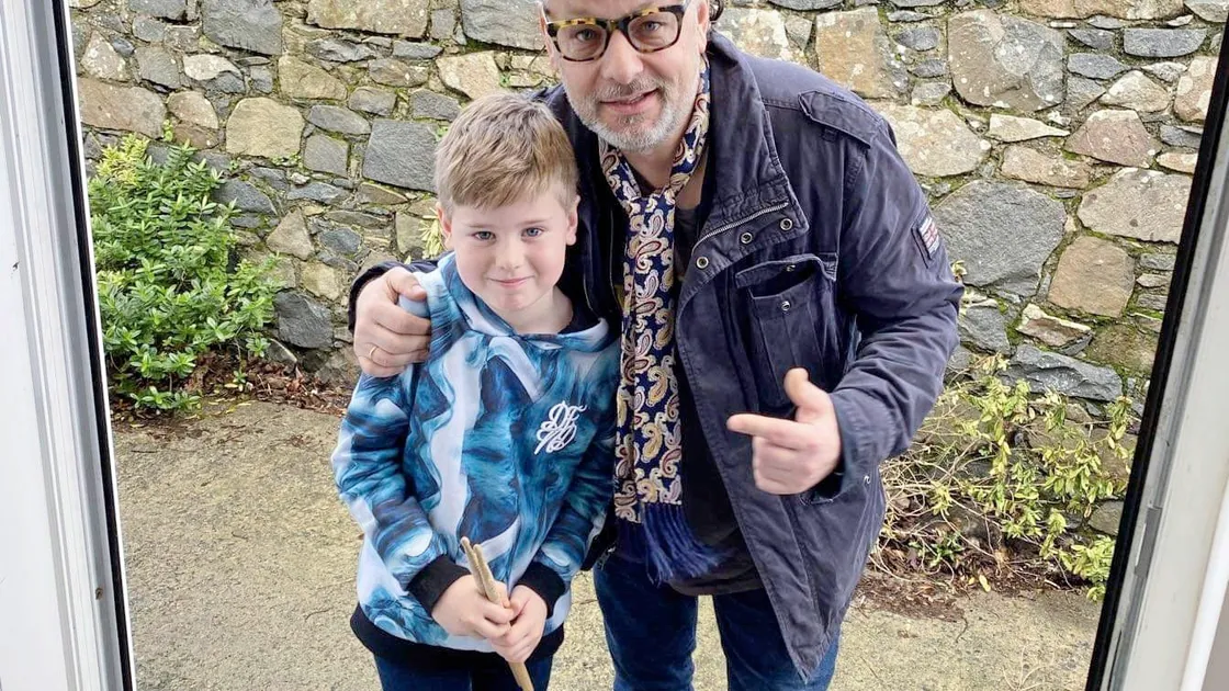 Ralph Salmins with Gabe Newman, 8. (26925070)