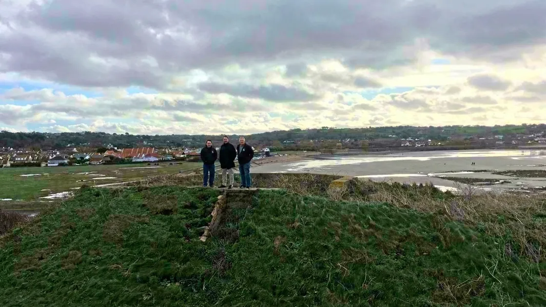 Festung Guernsey project co-ordinators Steve Powell (left) and Paul Bourgaize (right) with PF+A architectural support Pete Falla on top of the PAK bunker at Fort Hommet Headland. (Picture by Emily Hubert, 29064670)