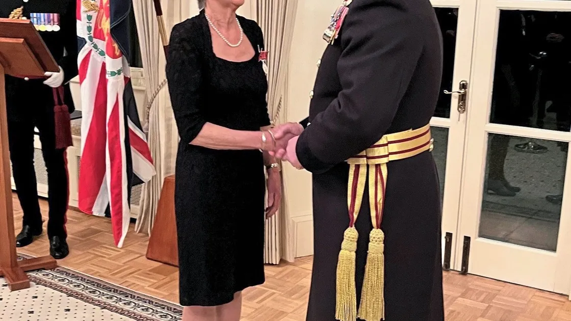 Marguerite Talmage was awarded the British Empire Medal in the 2024 King's Birthday Honours List for services to the community in Guernsey. Pictured with Lt-Governor Richard Cripwell. (34013974)