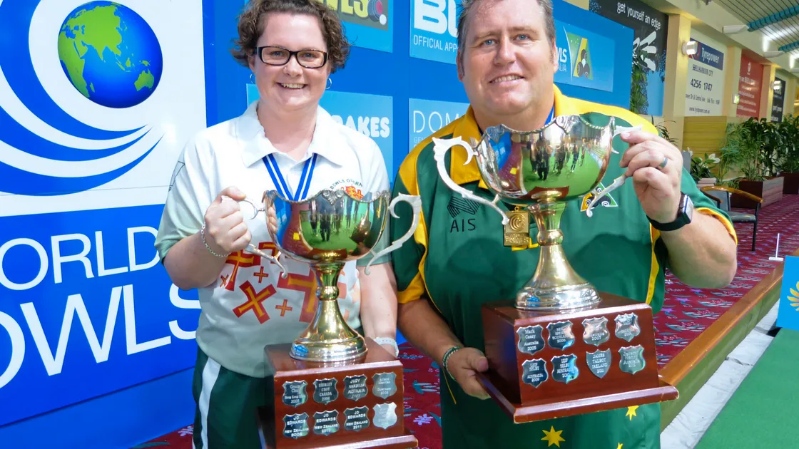 Champions: Guernsey's Lucy Beere and Australia's Jeremy Henry won the respective women's and men's singles titles at the Bowls World Cup in Warilla.