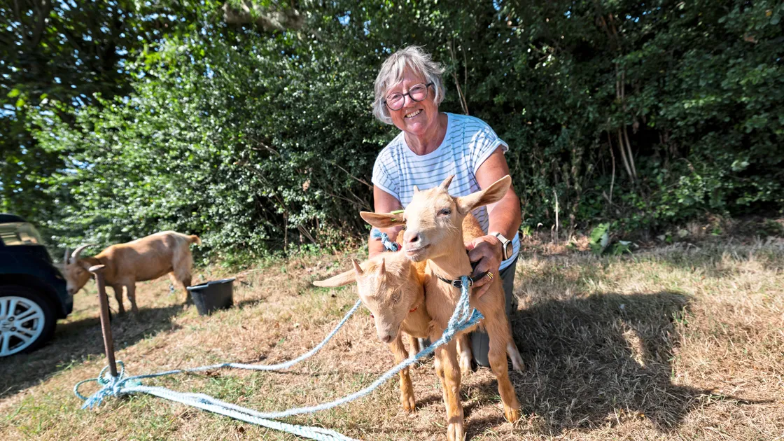 Margaret Robilliard with her 9-week-old goats