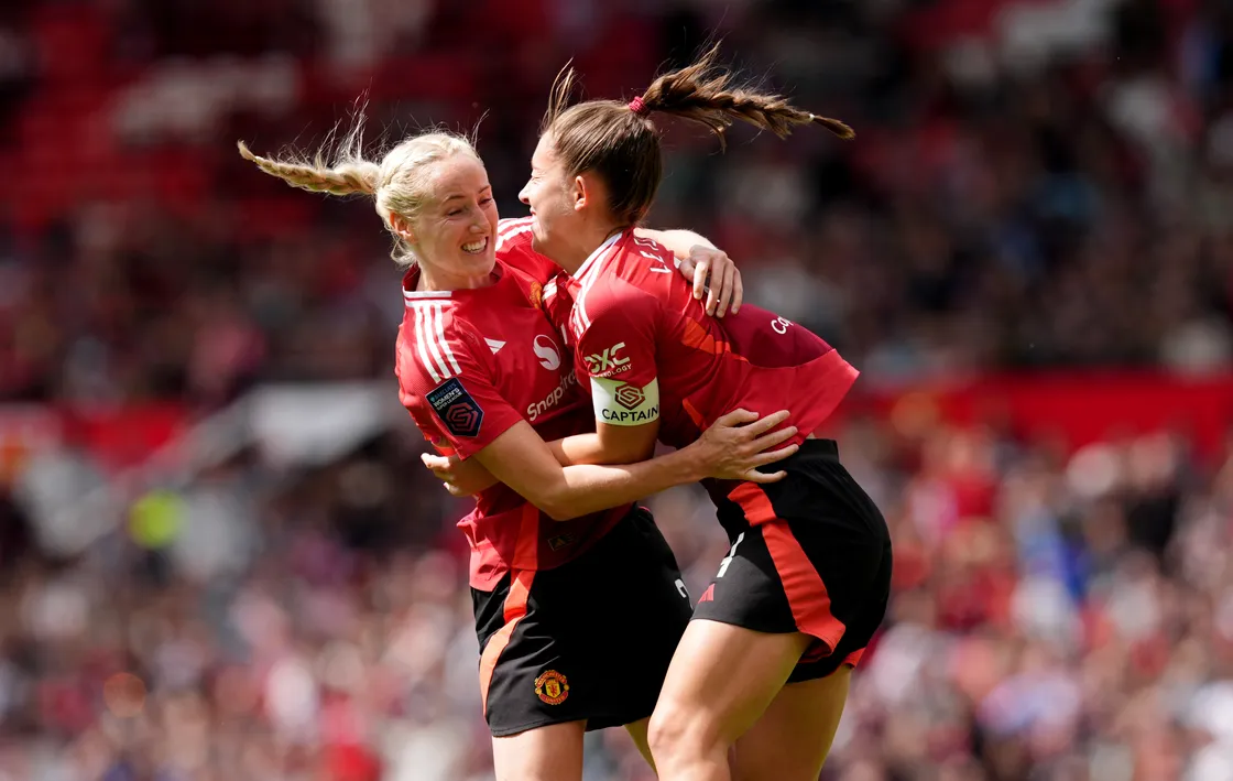 Manchester United's Millie Turner (left) and Maya Le Tissier celebrate after Sunday’s match at Old Trafford.