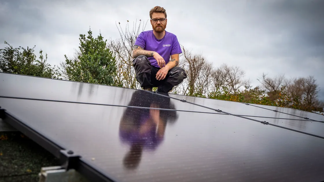 Jack Fletcher of Renew Guernsey has welcomed moves to relax of rules on installing solar panels, air source heat pumps and electric vehicle charging points. Yesterday he was installing solar panels on a shed roof. (Picture by Sophie Rabey, 30184426)