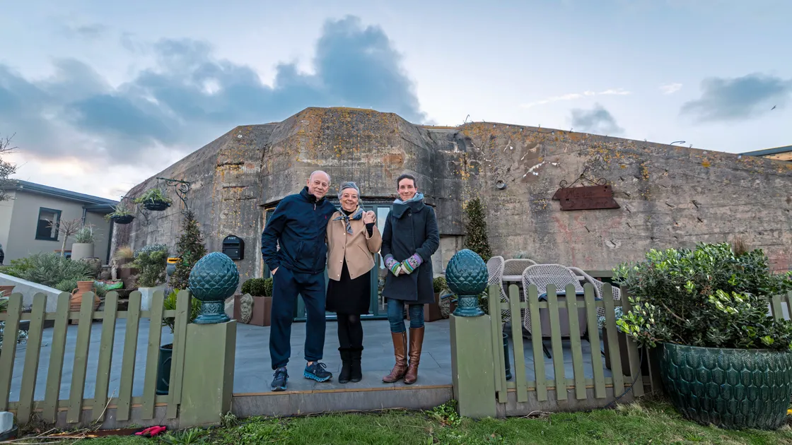 Policy & Resources president Lindsay de Sausmarez, right, with Mark and Karen Allez at their Maison de la Guerre property next to Fort Richmond