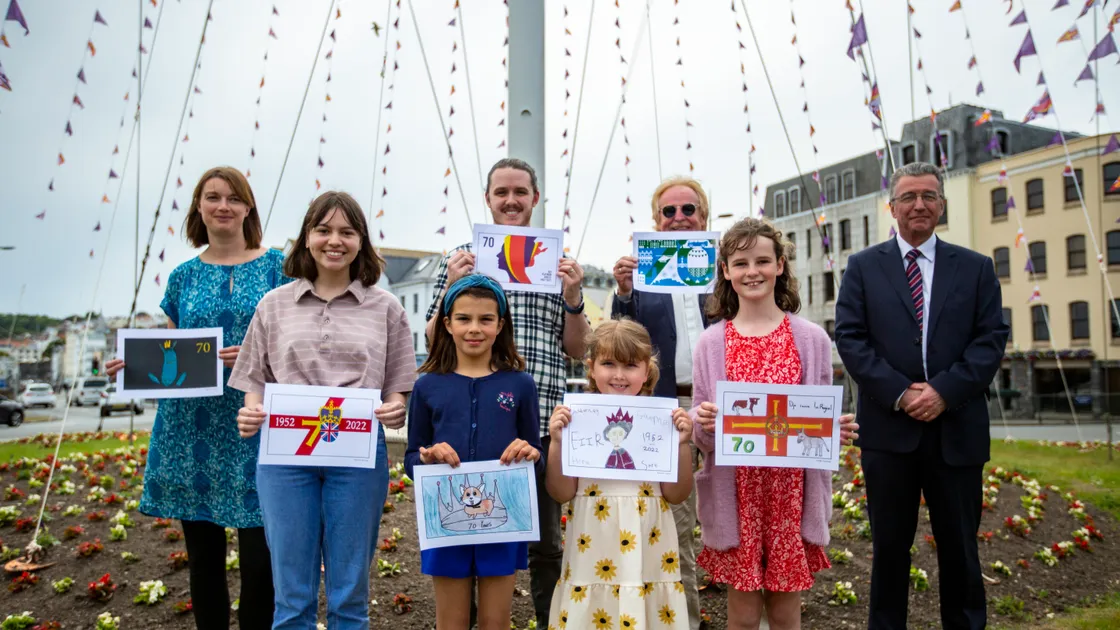 As well as the raising of the Platinum Jubilee Flag for Guernsey, other entrants were invited to attend. Seen holding their entries are, back row, left to right, Lucy Brimage (art teacher from Le Rondin representing entrant Rudy Le Prevost who couldn’t be present), winner Ben Le Marchant, Education, Sport & Culture vice-president Deputy Bob Murray (holding artwork from Chloe Sarre who couldn’t be present) and Bailiff Richard McMahon. Front row: Dora McGahy, 18, Chloe Norman, 10, Eden De Castro, 6, from Alderney, and Emily Garland, 10. (30847510)