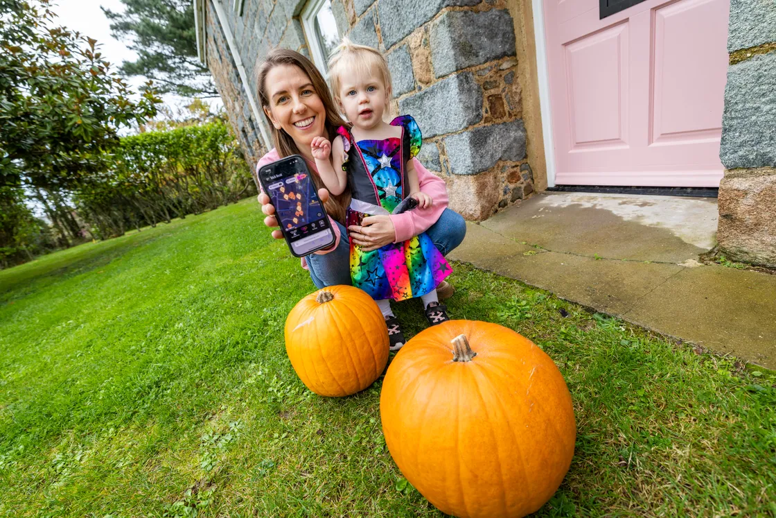 Michelle with her one-year-old daughter Zetta. Michelle designed the Trick or Treat interactive map to give people information on which households accept people knocking on Halloween
