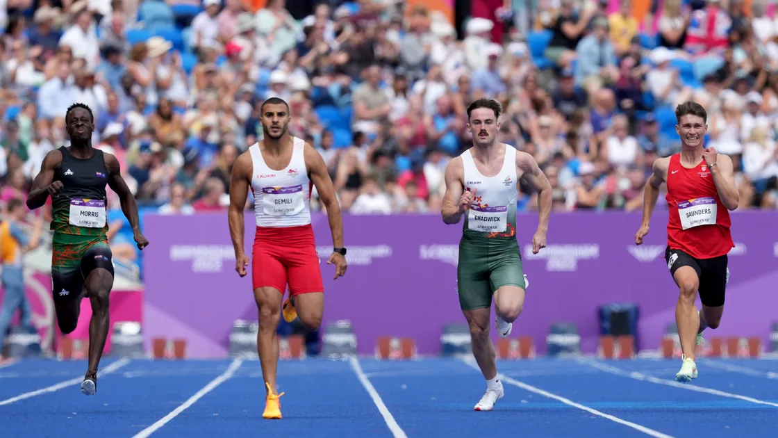 Joe Chadwick competing alongside Adam Gemili of England, Montserrat’s Julius Morris and Jersey’s Zachary Saunders in the men’s 200m of the Birmingham 2022 Commonwealth Games.
